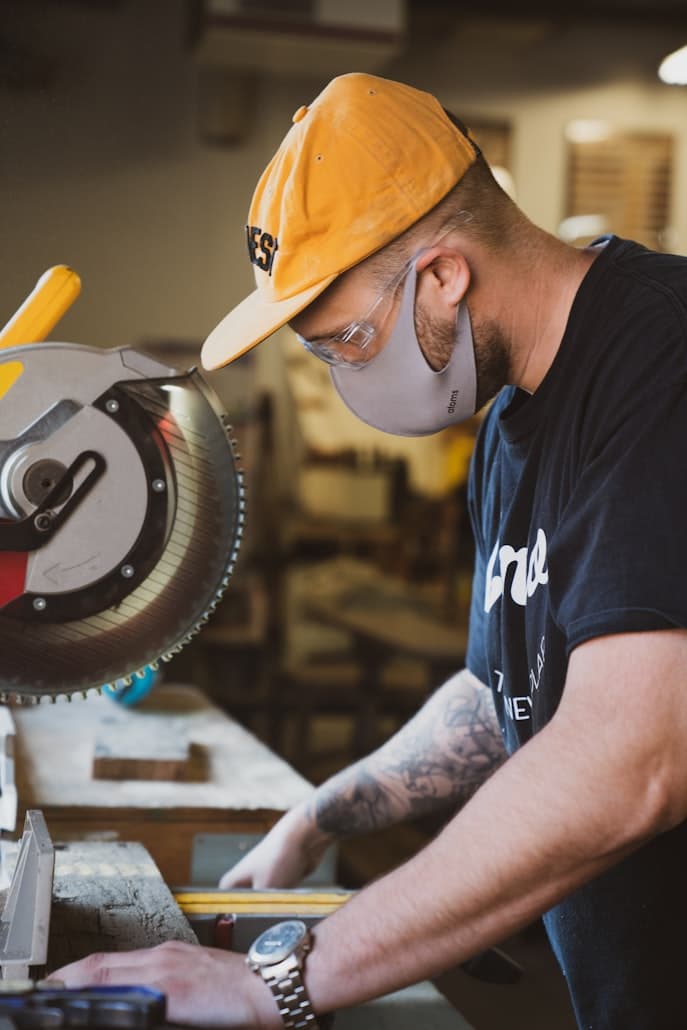 Craftsman working hands-free with tools